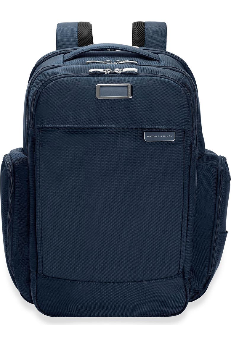 compare briggs and riley with tumi backpack & Medium Widemouth - Carry On Travel Backpack for Women & Men, Personal Item Bag, Self-Repairing Zippers, Padded Straps, Fits up to 15.6" Laptop Modern travelers who need to stay organized will find a place for everything in the Baseline Traveler Backpack Large Cargo Backpack | Soft