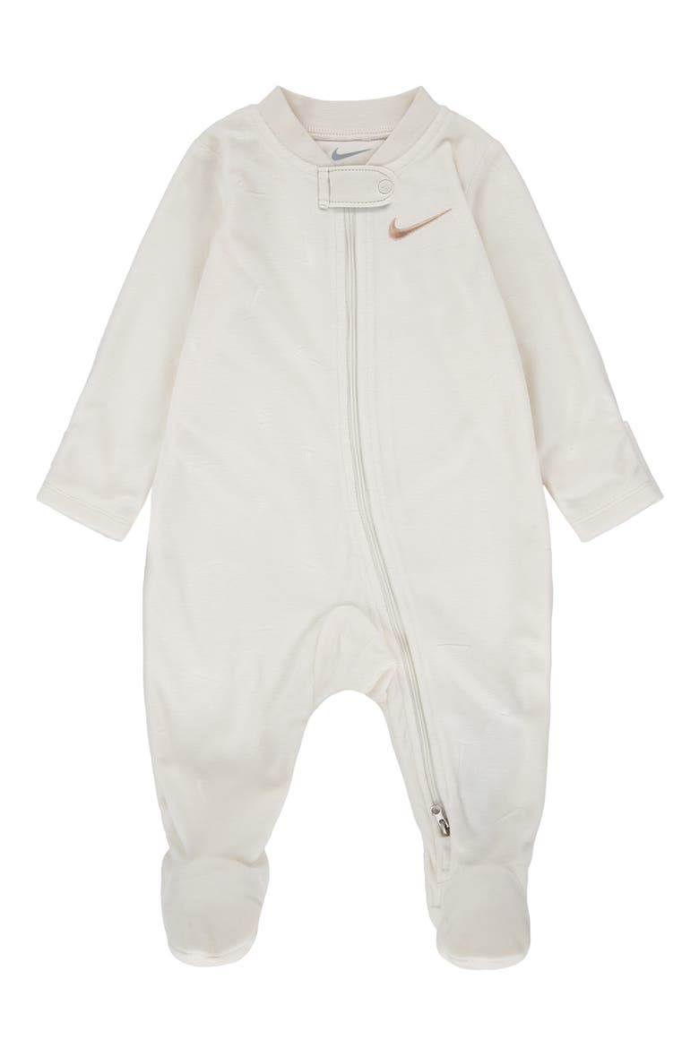 Essentials Swoosh Print Velour Footie<br /><br /><br /><br /><br /><br /><br /><br /><br /><br /><br /><br /><br /><br /><br /><br /><br /><br /><br /><br /><br /><br /><br /><br />Essentials Fleece Footie, Main, color, PALE IVORY
