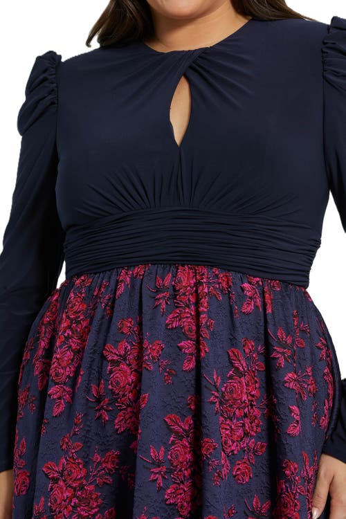 Mac Duggal Long Sleeve Keyhole Knot Neck Brocade Floral Detail Bottom Plus Size Gown In Midnight