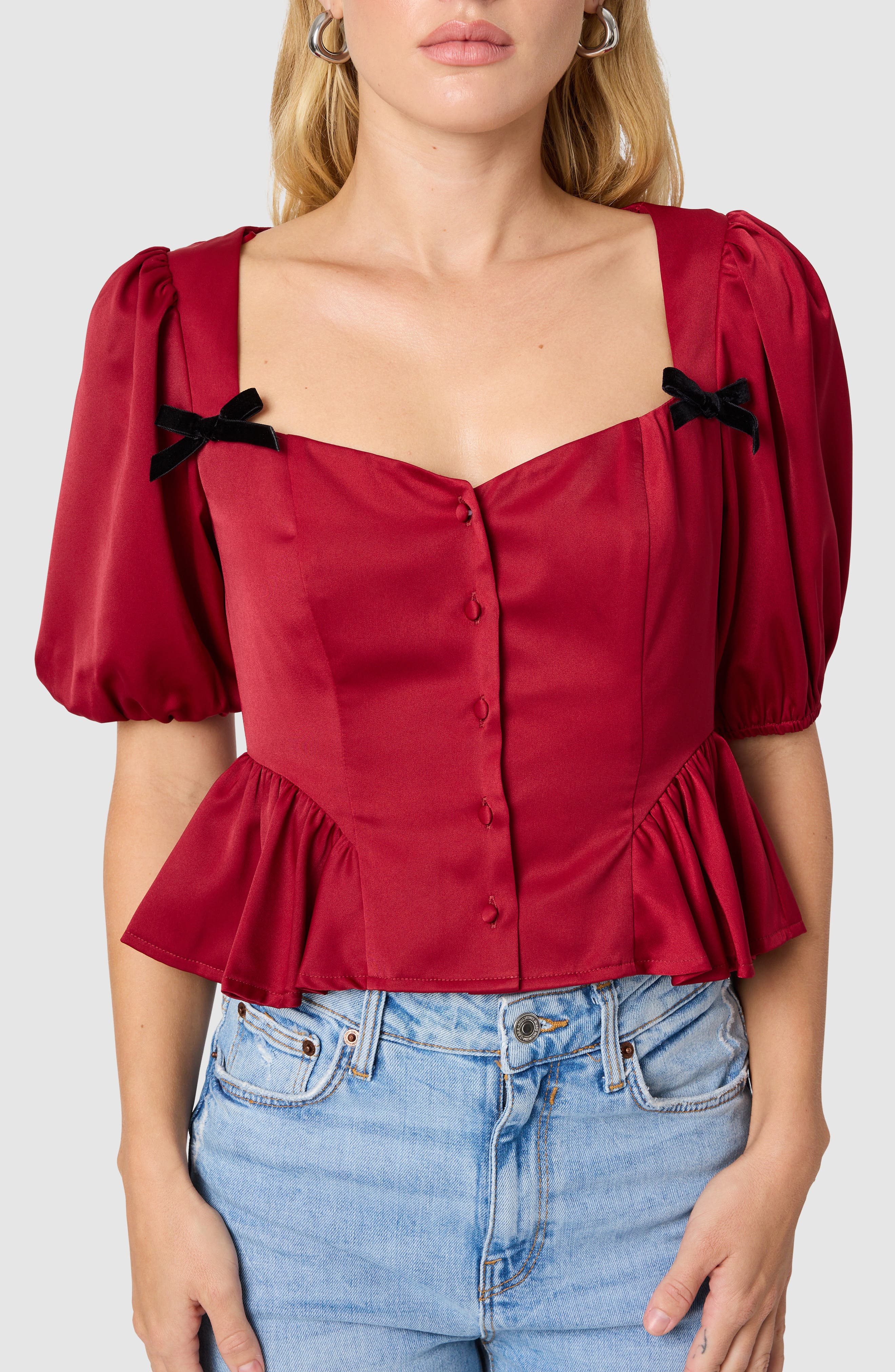 Lush Bow Appliqué Peplum Top