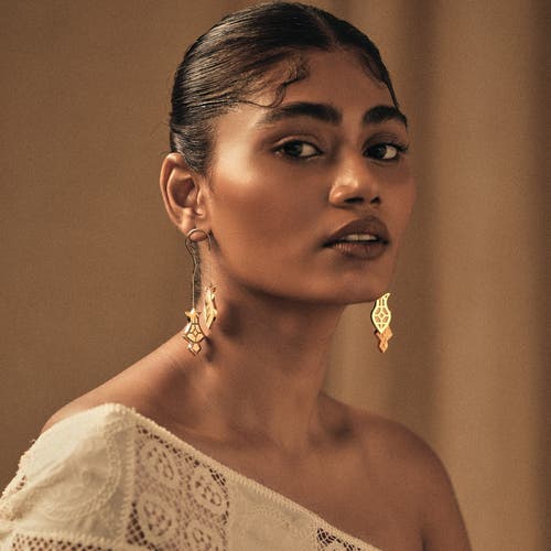 Dhwani Bansal Hamsa Earrings In Gold