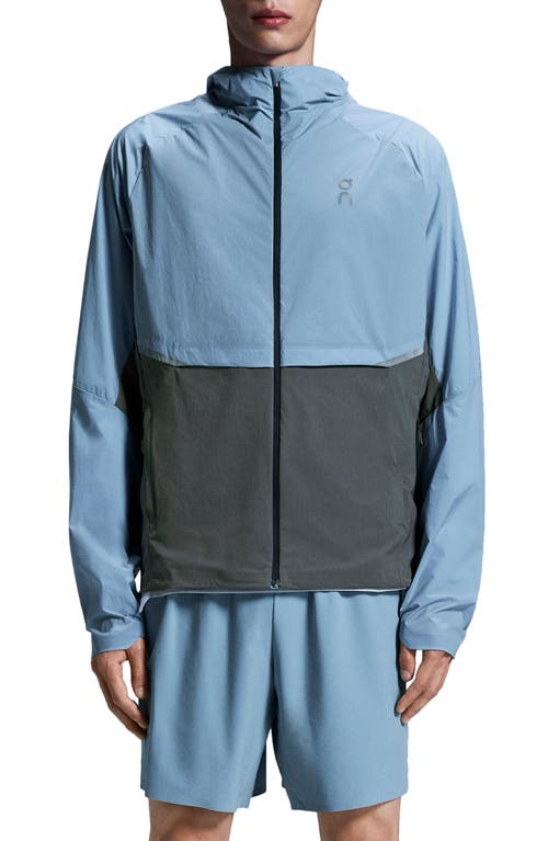 On Core Hooded Packable Running Jacket In Chambray/eclipse