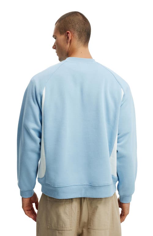 COTTON ON BOX FIT GRAPHIC CREW SWEATER