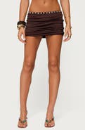 EDIKTED Giana Pearly Button Low Rise Miniskirt