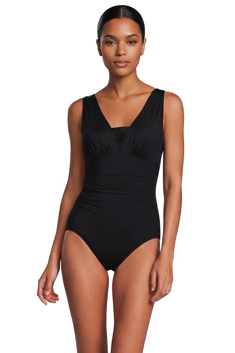 SlenderSuit Grecian Low Leg One Piece Swimsuit, Main, color, Black