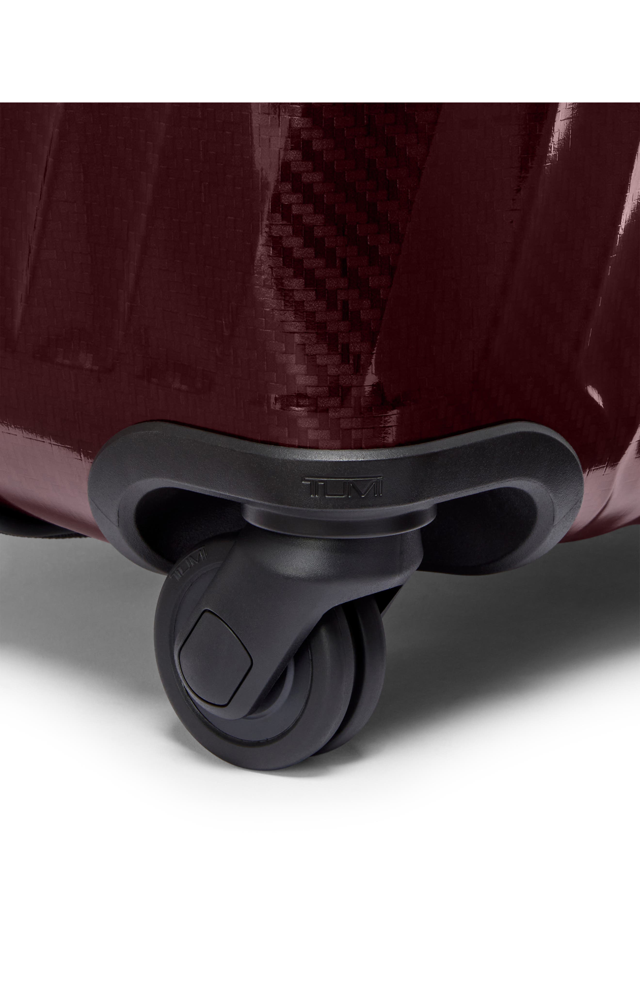 TUMI 30-Inch 19 Degree Extended Trip Expandable 4-Wheel Packing Case, Alternate, color, Wine