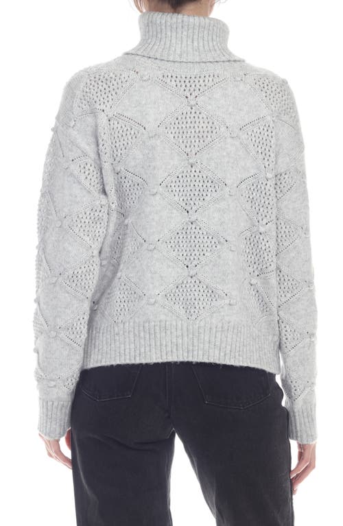 Rain And Rose Diamond Open Knit Turtleneck Sweater In Multi