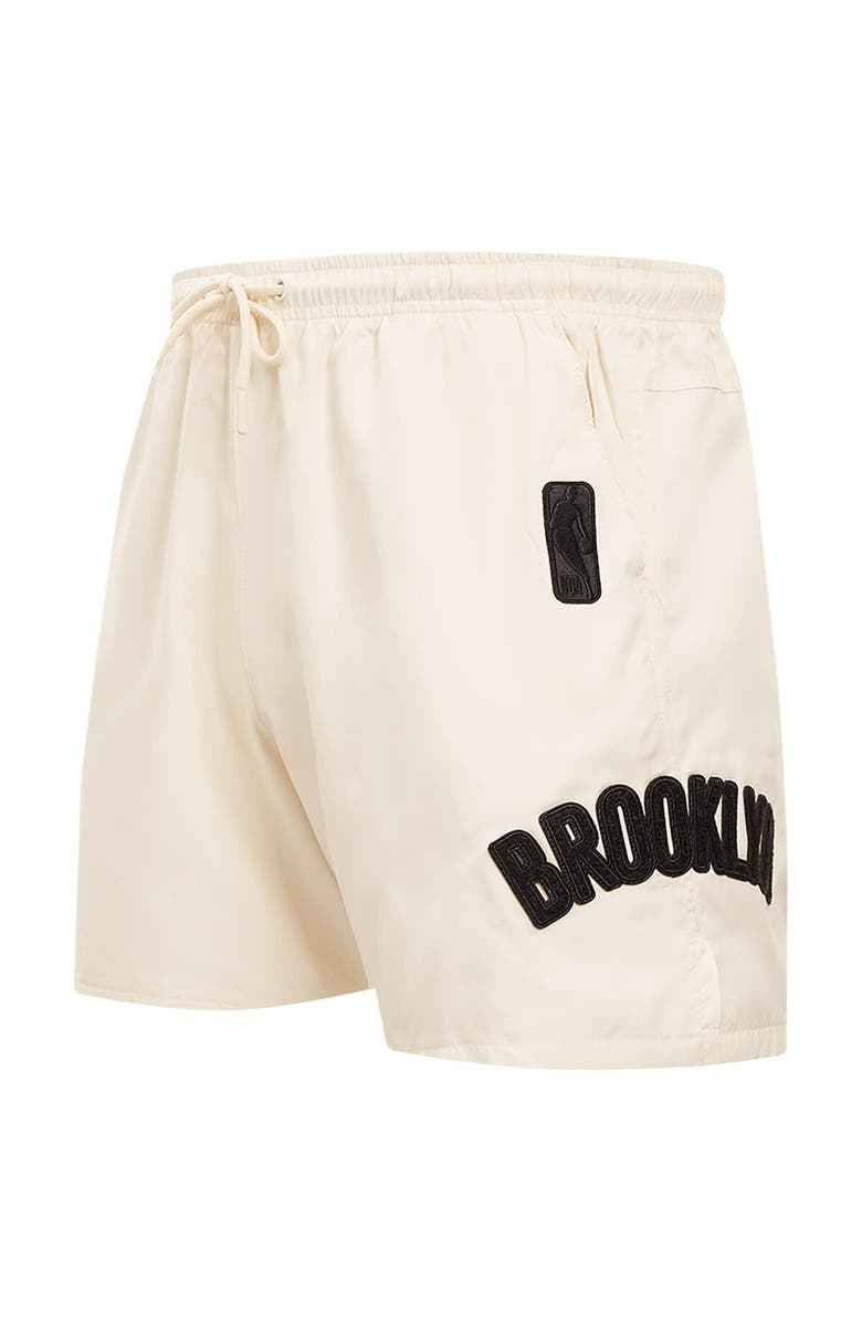 PRO STANDARD Men's Pro Standard Cream Brooklyn Nets Triple Tonal Woven Shorts, Alternate, color, Cream