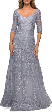 La Femme Embroidered Lace Gown with V Neckline and Flare Skirt