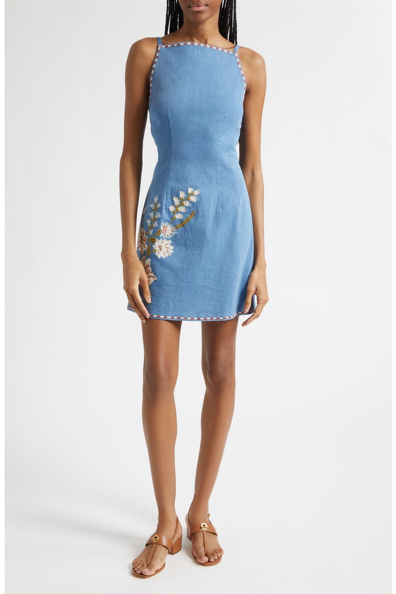 floral embroidered denim dress The embroidered denim midi timeless, feminine, and quietly statement-making. Designed with soft puff sleeves and intricate white detailing, it blends everyday ease with elevated charm. Perfect for modern summer dressing