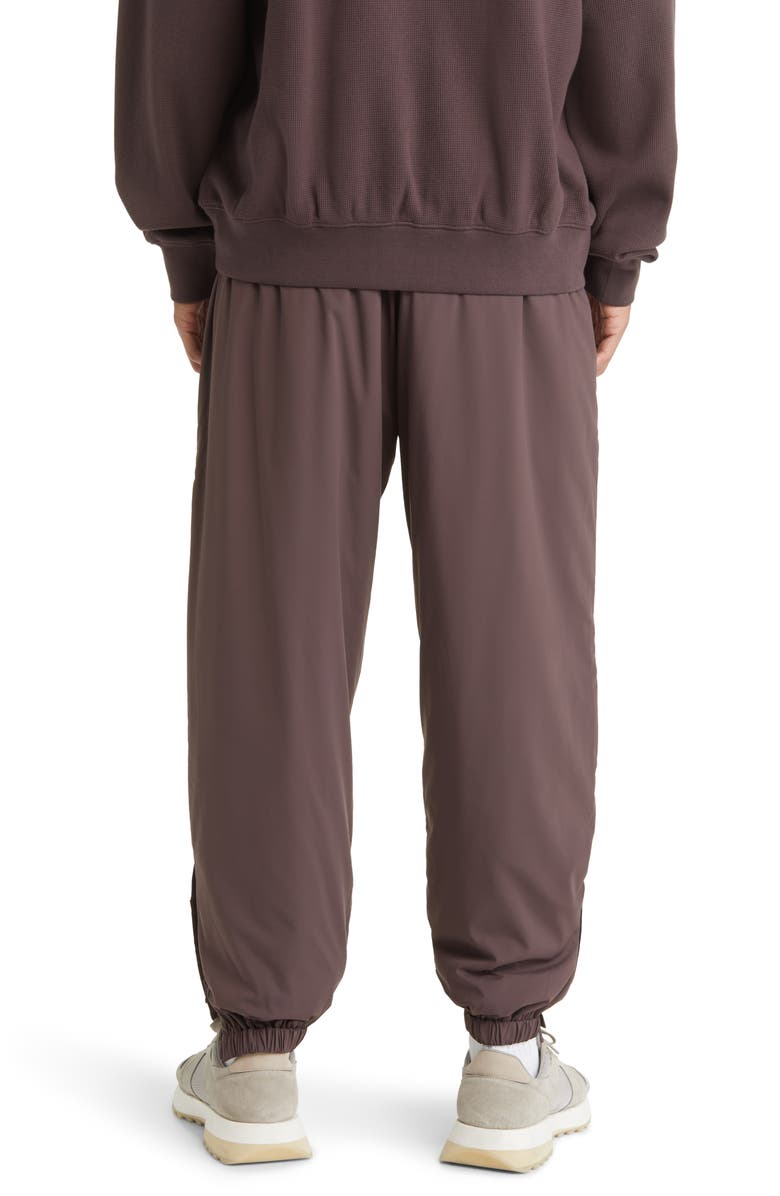 Fear of God Essentials Stretch Nylon Track Pants, Alternate, color,
