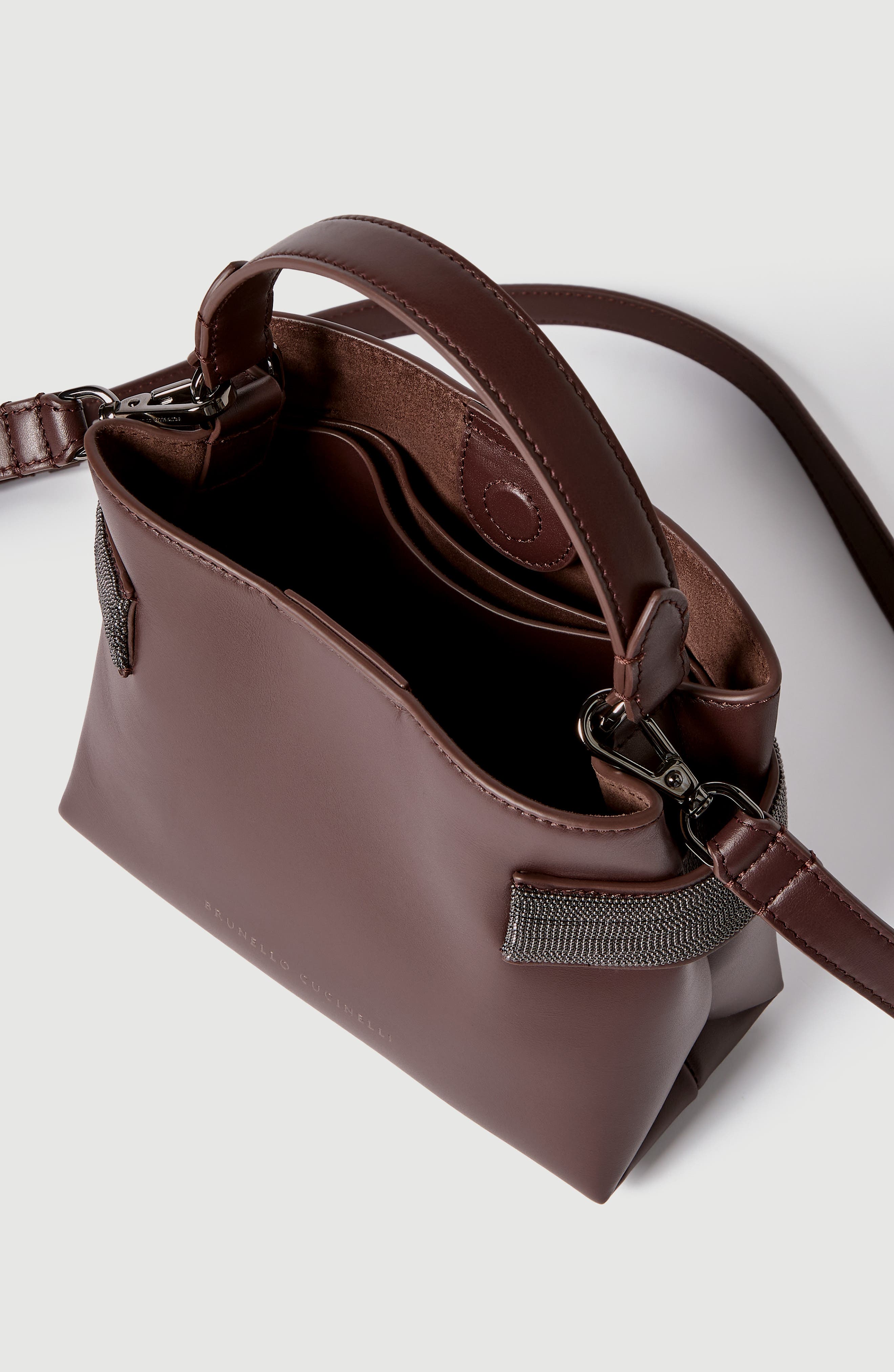 Essence small top-handle bag in calfskin with precious bands, Alternate, color, Burgundy