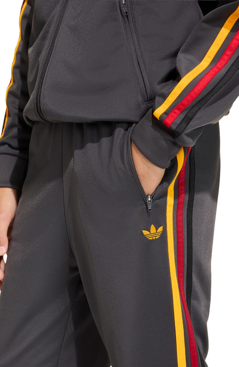 adidas Originals Kids' Firebird Recycled Polyester Track Pants, Alternate, color, Utility Black/ Collegiate Gold