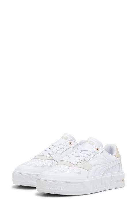 PUMA white athletic shoes selling for women