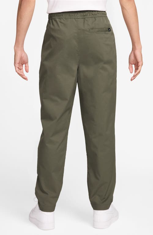 Nike Club Taper Woven Pants In Green