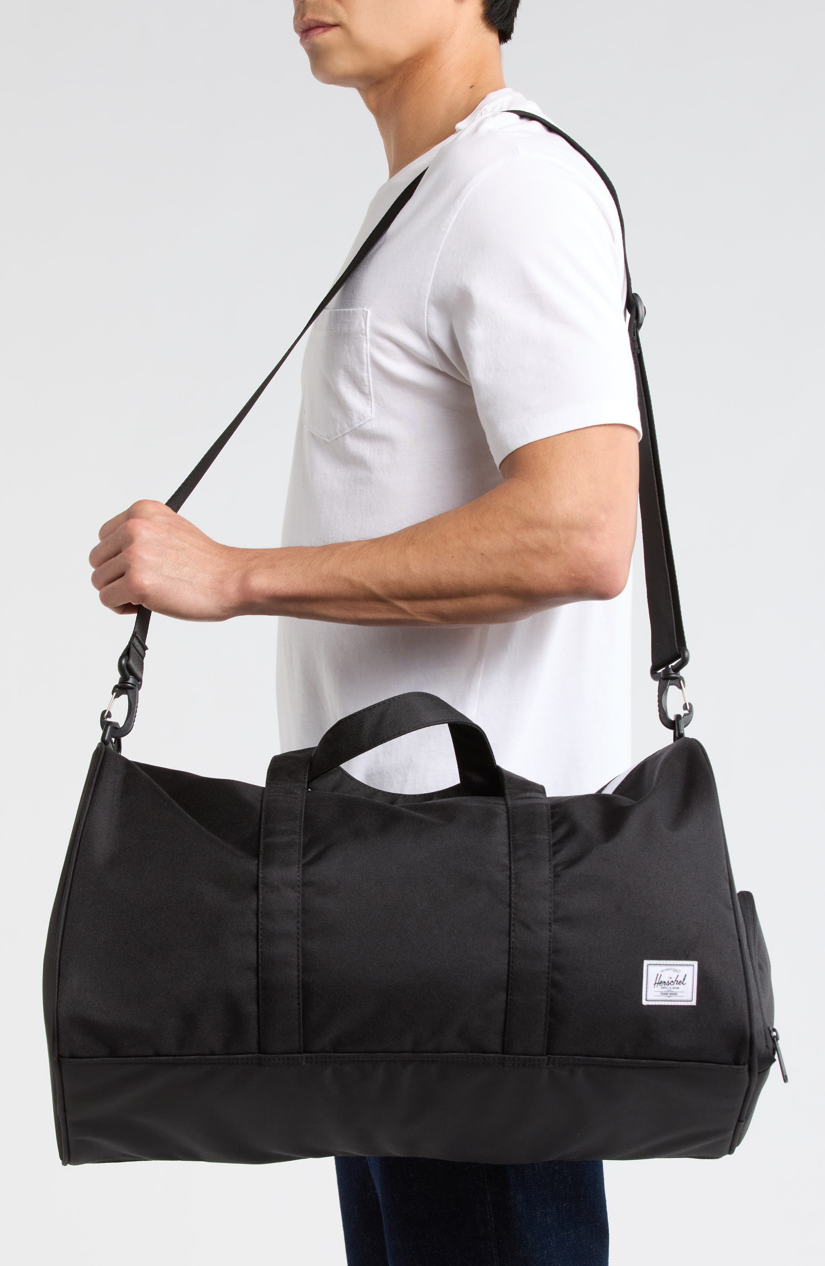 Herschel Supply Co. Novel Recycled Polyester Duffle Bag, Alternate, color, Black