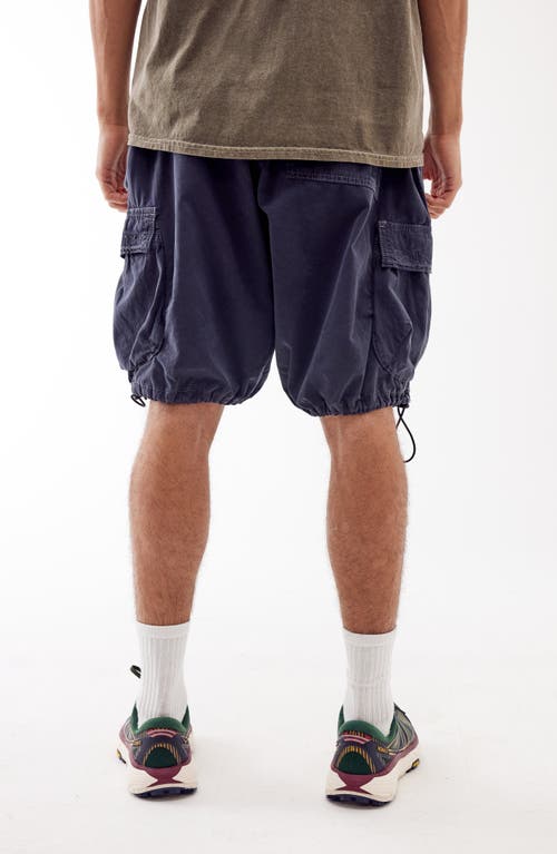 Shop Bdg Urban Outfitters Baggy Tech Cargo Shorts In Black