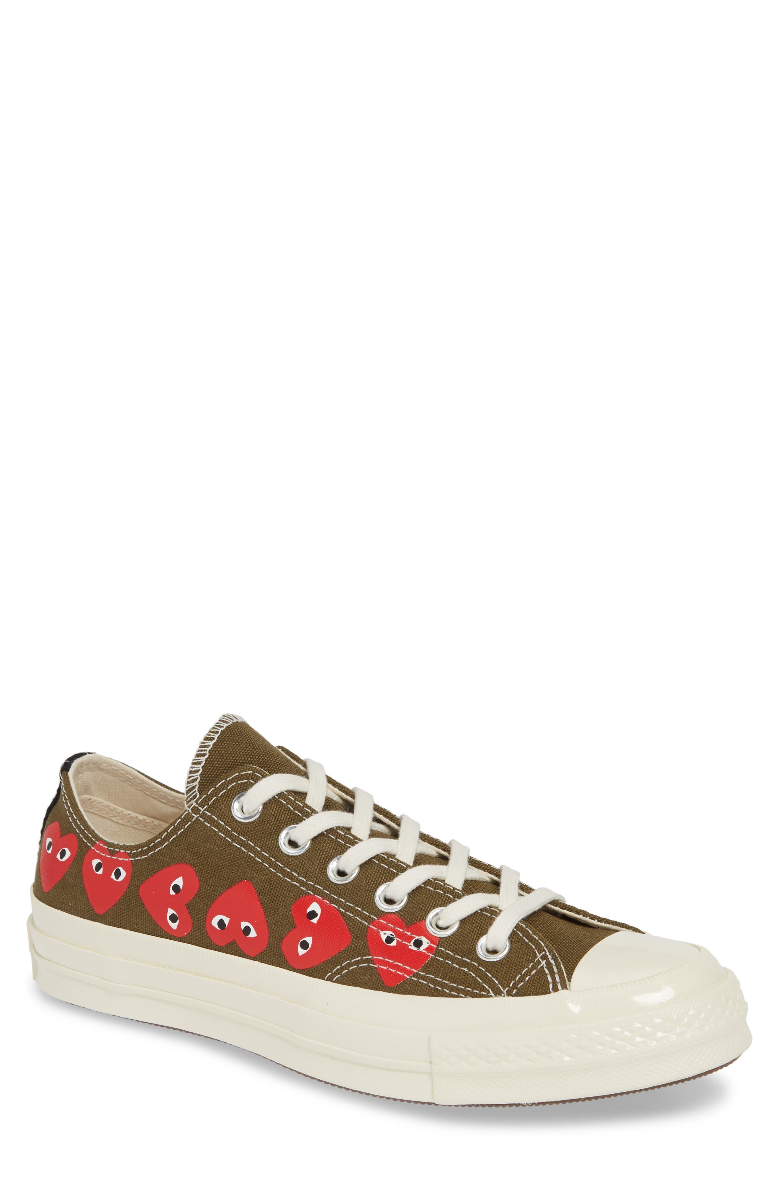 Comme des Garçons PLAY x Converse Gender Inclusive Chuck Taylor<sup>®</sup> All Star<sup>®</sup> Low Top Sneaker, Main, color, 