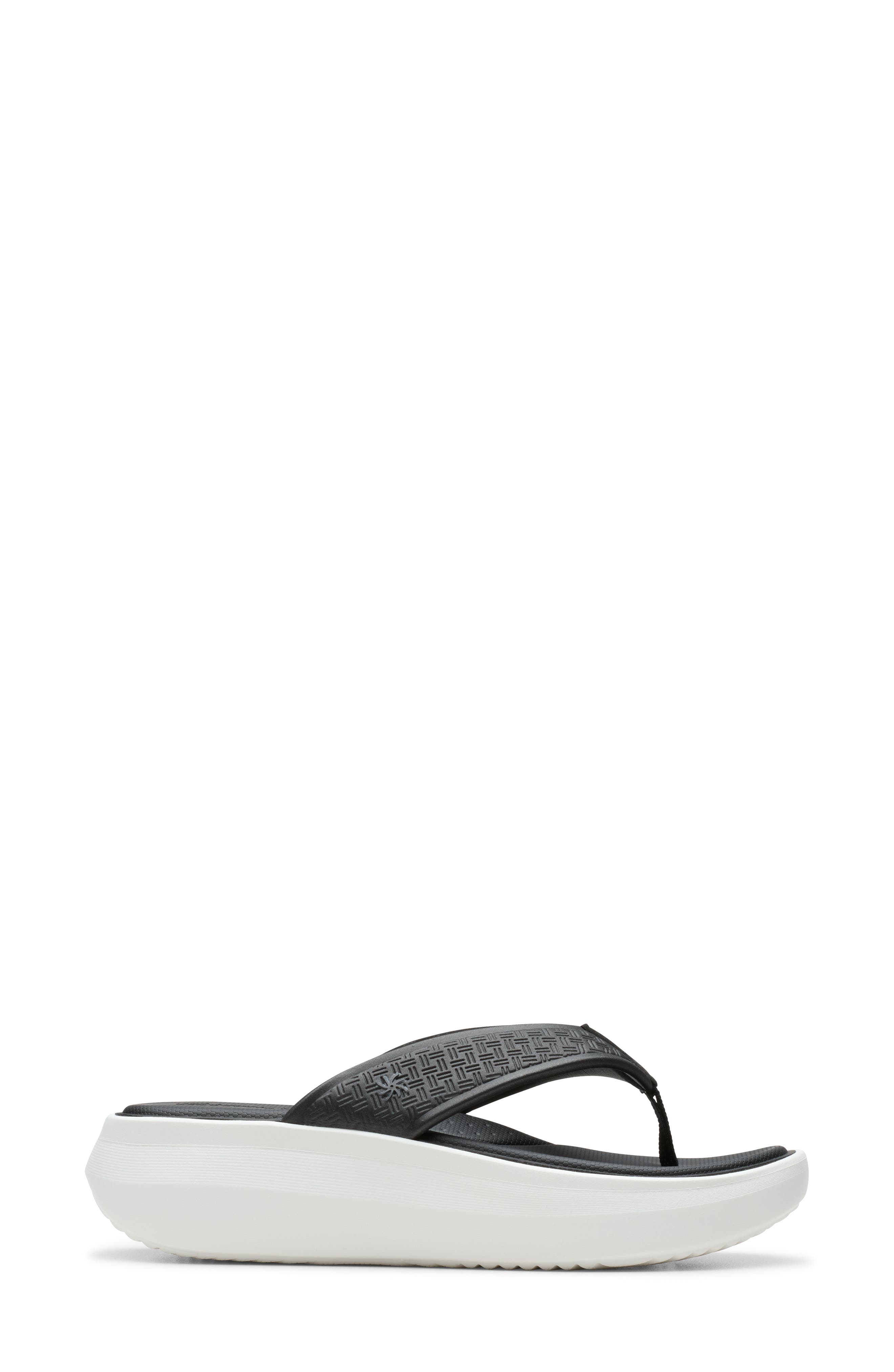 Clarks<sup>®</sup> Solevana Wedge Flip Flop, Alternate, color, Black