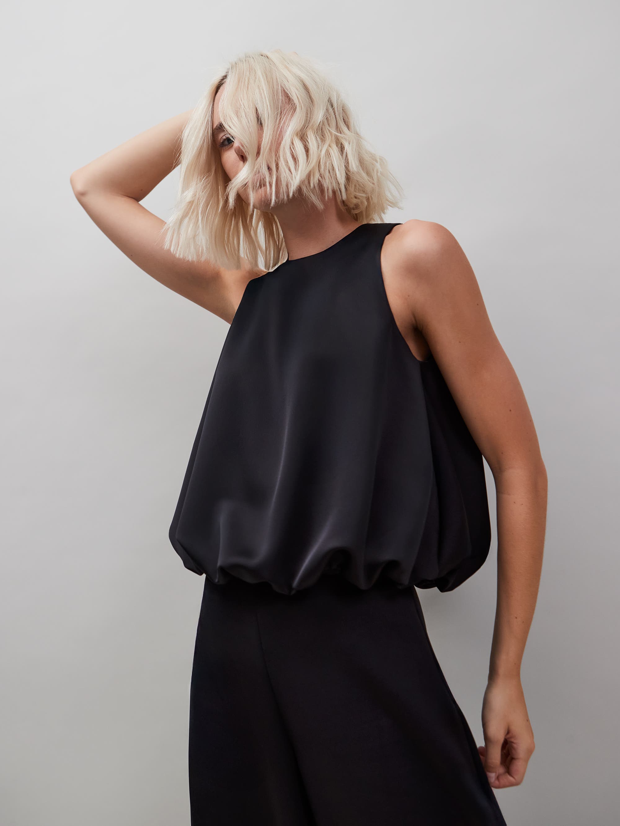 Sleeveless Bubble Hem Top