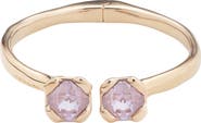 UNODE50 18k gold plated metal alloy rigid bracelet, with inner spring and two pink faceted crystals.