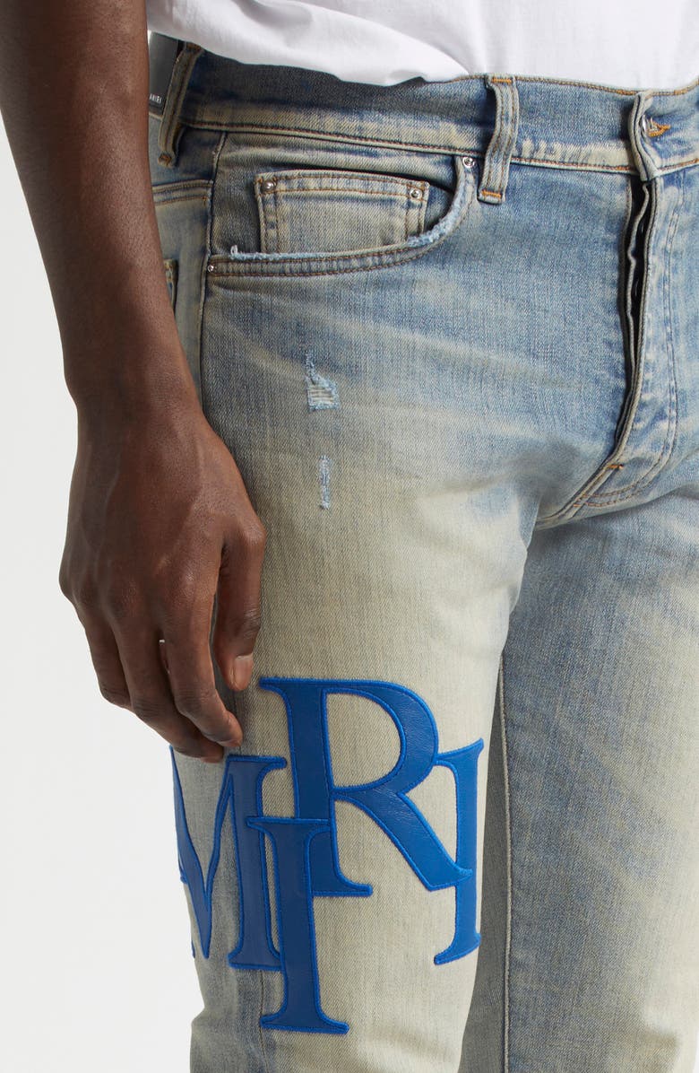 AMIRI Staggered Logo Skinny Jeans, Alternate, color, 