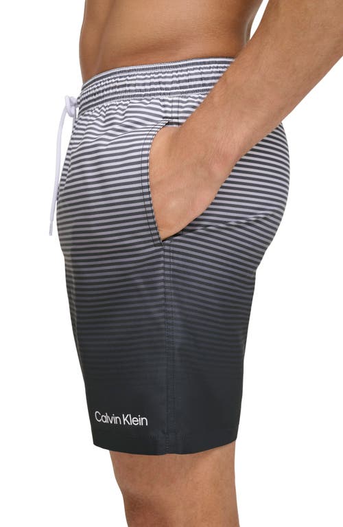 Shop Calvin Klein Gradient Stripe Swim Trunks In Black