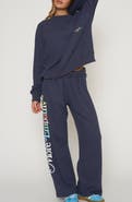 THE MAYFAIR GROUP World Needs Empathy Waffle Knit Fleece Graphic Sweatshirt