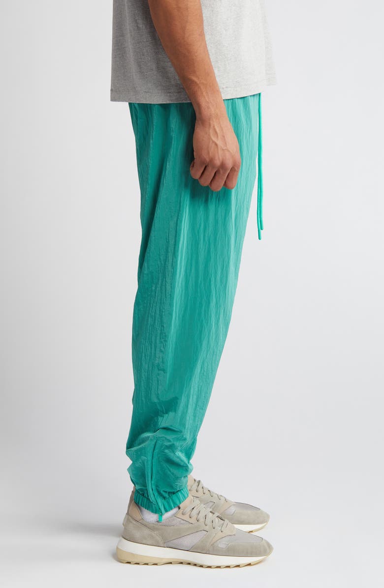 Fear of God Essentials Stretch Nylon Track Pants, Alternate, color,