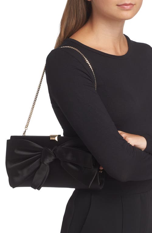 Stuart Weitzman The Vip Loveknot Clutch In Black