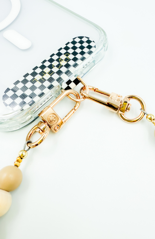 The Cæp Universal Wristlet In White