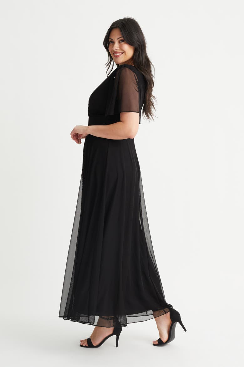 angel sleeve black dress Vintage 1970's Black Tissue Weight Cotton and Lace Tapered Angel Sleeve Dress With a Dramatic Hi-lo Hem and Stunning Smocked Waistline. Vamp