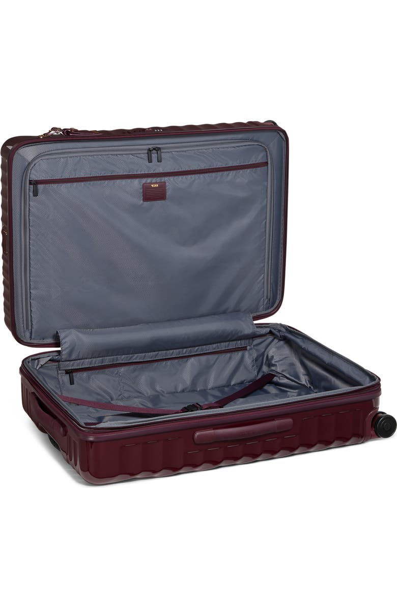 TUMI 30-Inch 19 Degree Extended Trip Expandable 4-Wheel Packing Case, Alternate, color, Wine