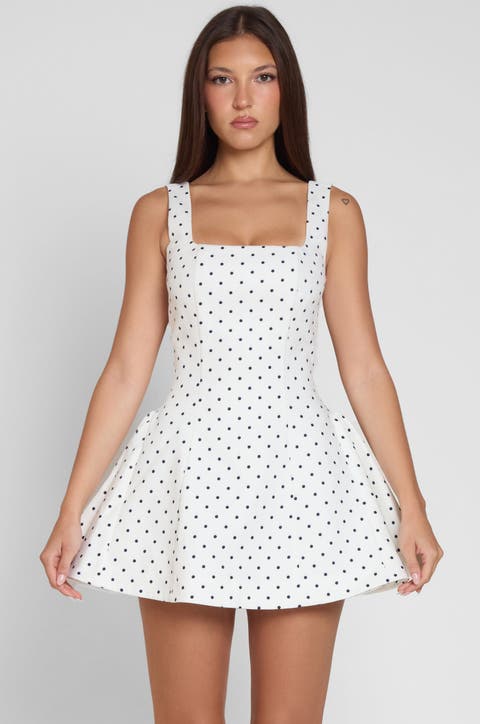 designer white mini dress Romantic Allure Satin Mid weight material Off the shoulder style Large bow detailing on bust Invisible zip left side Inner bust grip Fully lined Strapless mini dress style Slight stretch Perfect for homecoming White Mini Dresses - For