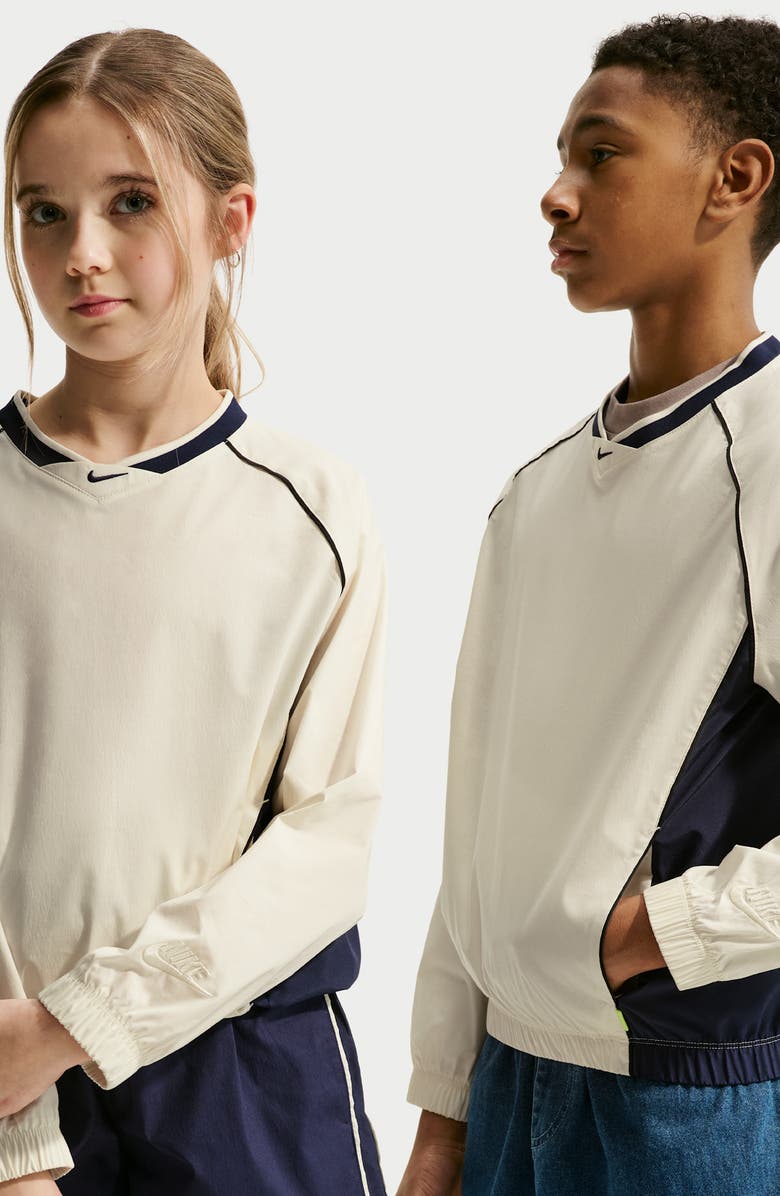 Nike Kids' Woven Long Sleeve V-Neck T-Shirt, Alternate, color, Soft Pearl/ Navy/ Black