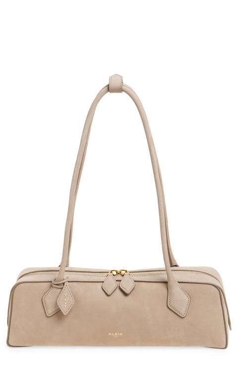 【ALAIA】LE CCEUR パテントカーフスキンフラットスリングバック ALAÏA LE CŒUR パテントラムスキン製 スリングバッグ | パンプス