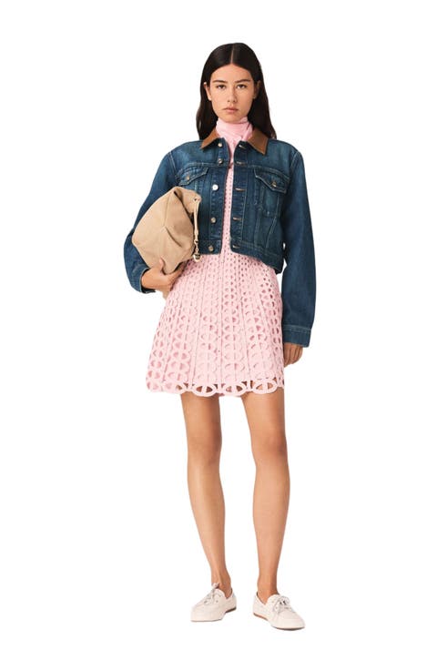 Denim jacket with leather collar