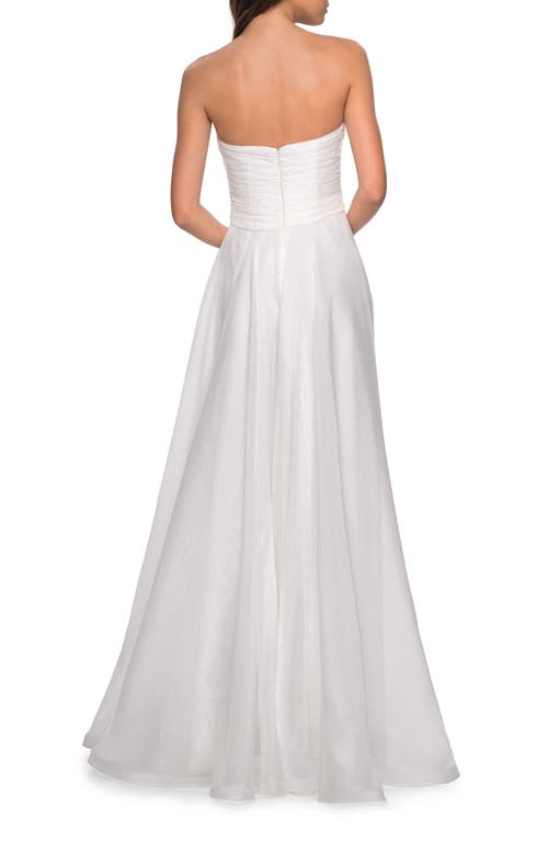 La Femme Strapless Chiffon Dress With Criss Cross Bodice Detail In White
