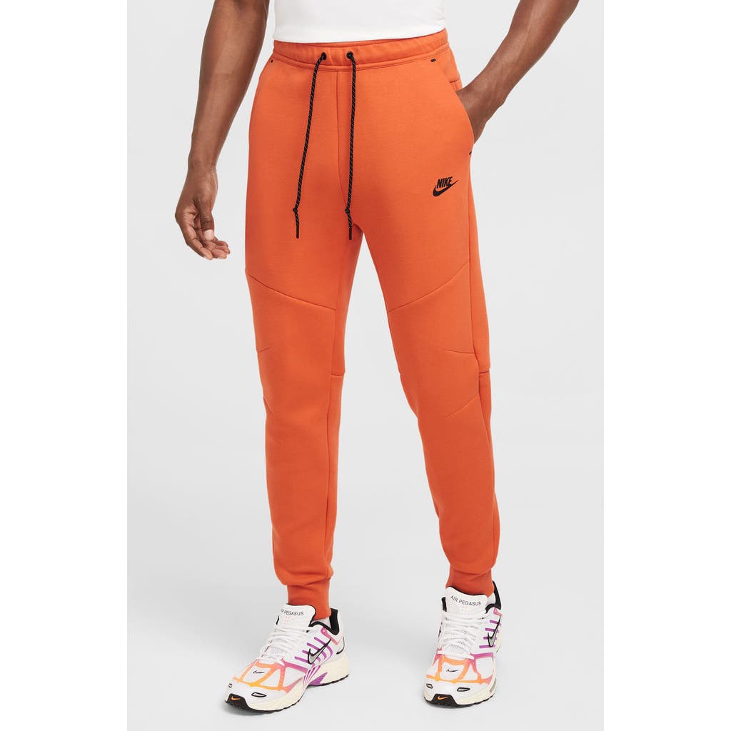 Nike Tech Fleece Joggers In Orange