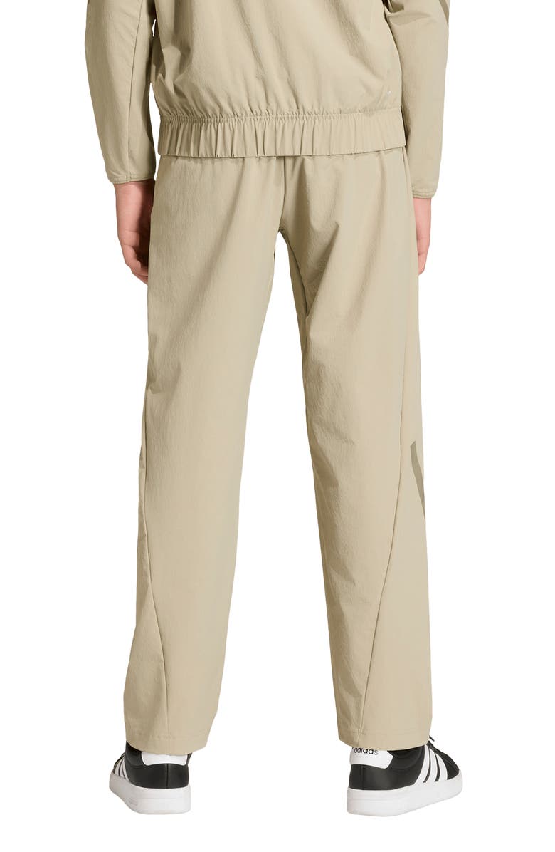 adidas Originals Kids' Z.N.E. Woven Travel Pants, Alternate, color, Wonder Cargo/ Clay