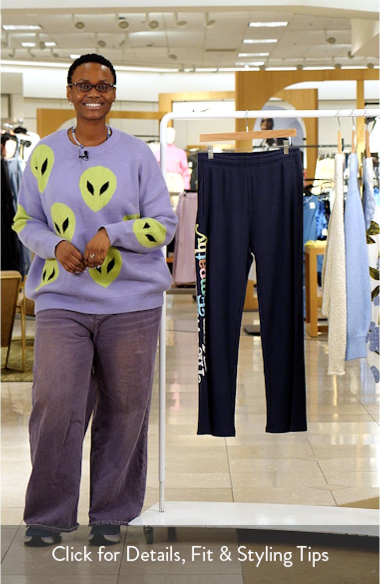 World Needs Empathy Waffle Knit Fleece Graphic Sweatpants, sales video thumbnail