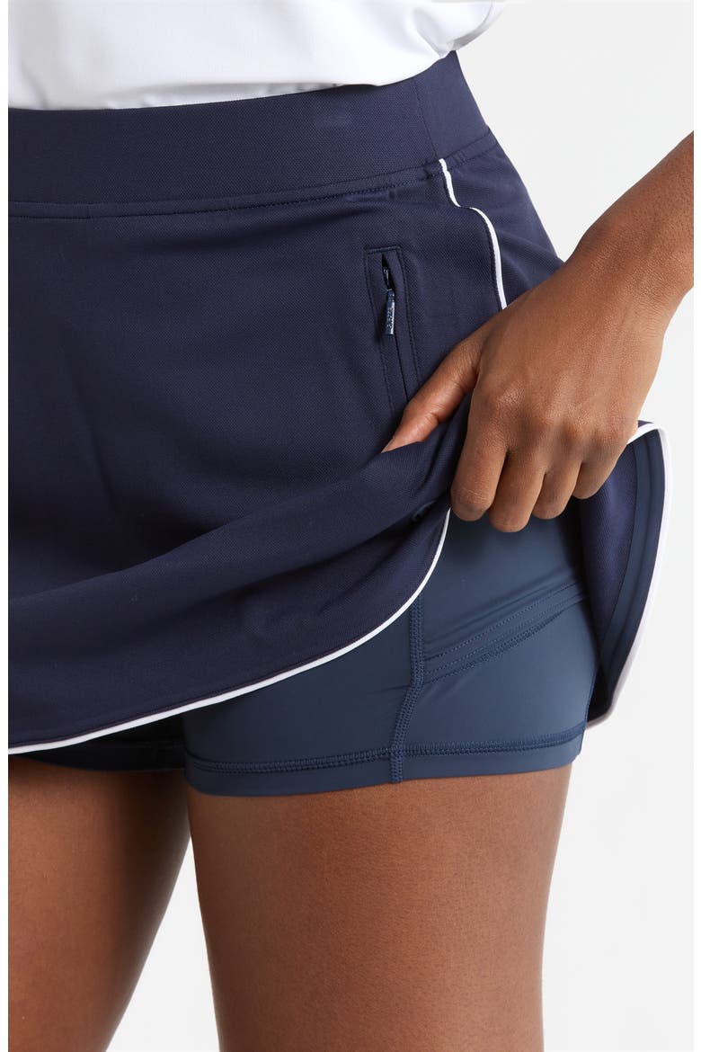 Mid Rise Tulip Hem Piqué Golf Skort, Alternate, color, TWILIGHT