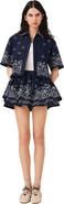 maje Short embroidered ruffled skirt