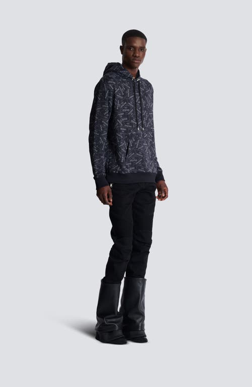 Shop Balmain Hoodie With All-over Label Print