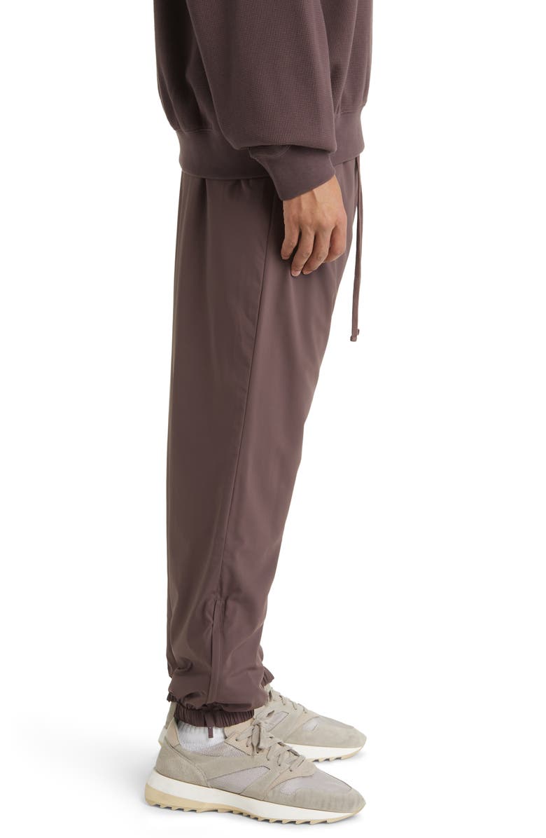 Fear of God Essentials Stretch Nylon Track Pants, Alternate, color,