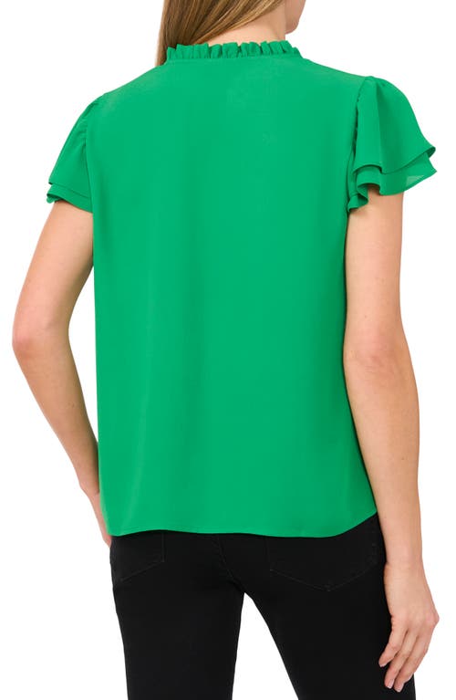 Cece Flutter Sleeve Keyhole Top In Medium Green
