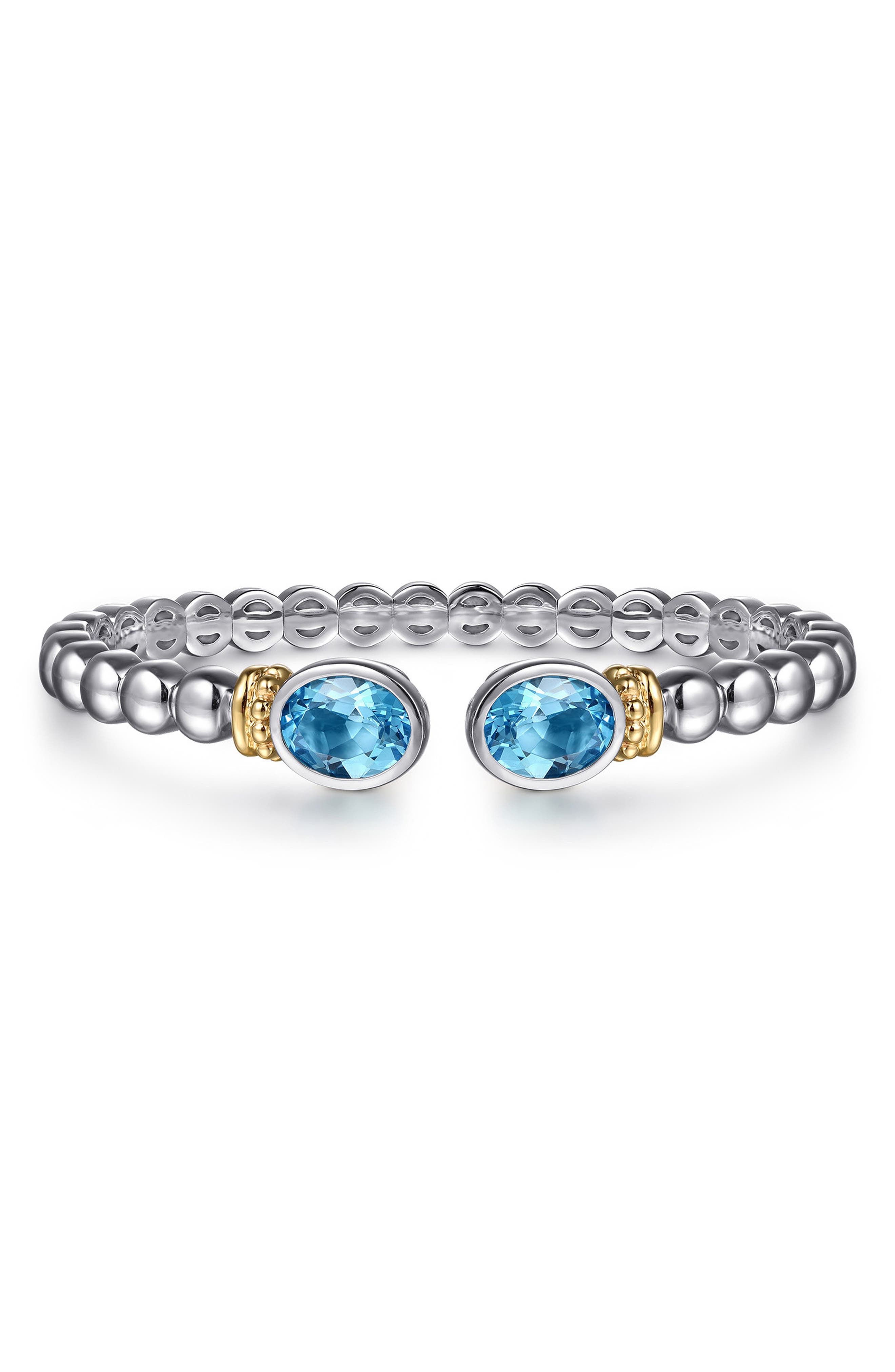 selected STERLING / 14K/ BLUE TOPAZ