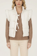 Modenaire Ruffle Shoulder Puffer Vest with Front Tie Closures and Stand Collar