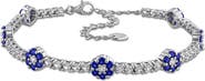 DELMAR Sterling Silver Created Sapphire Floral Cluster Line Bracelet