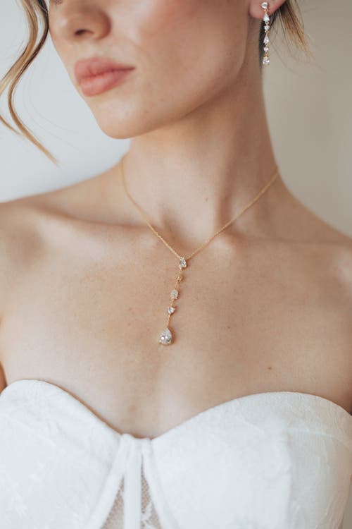 Untamed Petals Lunar Crystal Drop Pendant In Gold